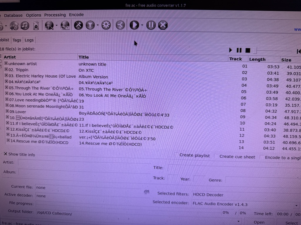 A screenshot of fre:ac showing garbled text