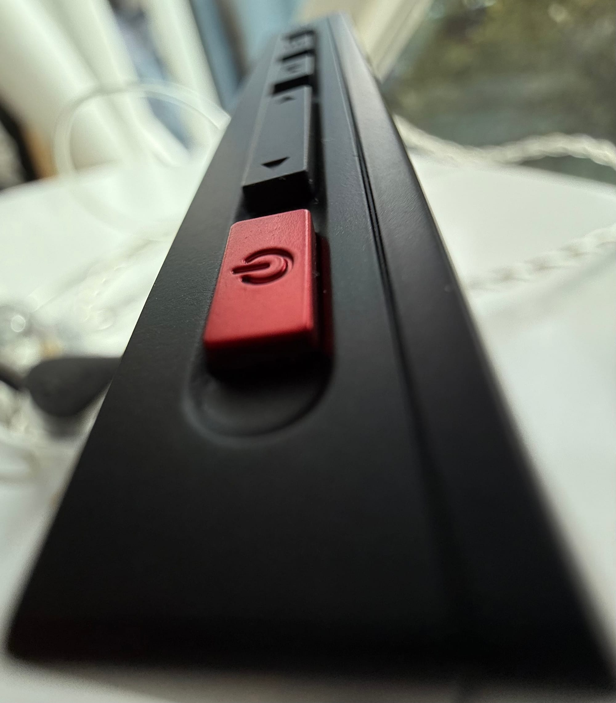 The top of the Echo Mini showing the buttons